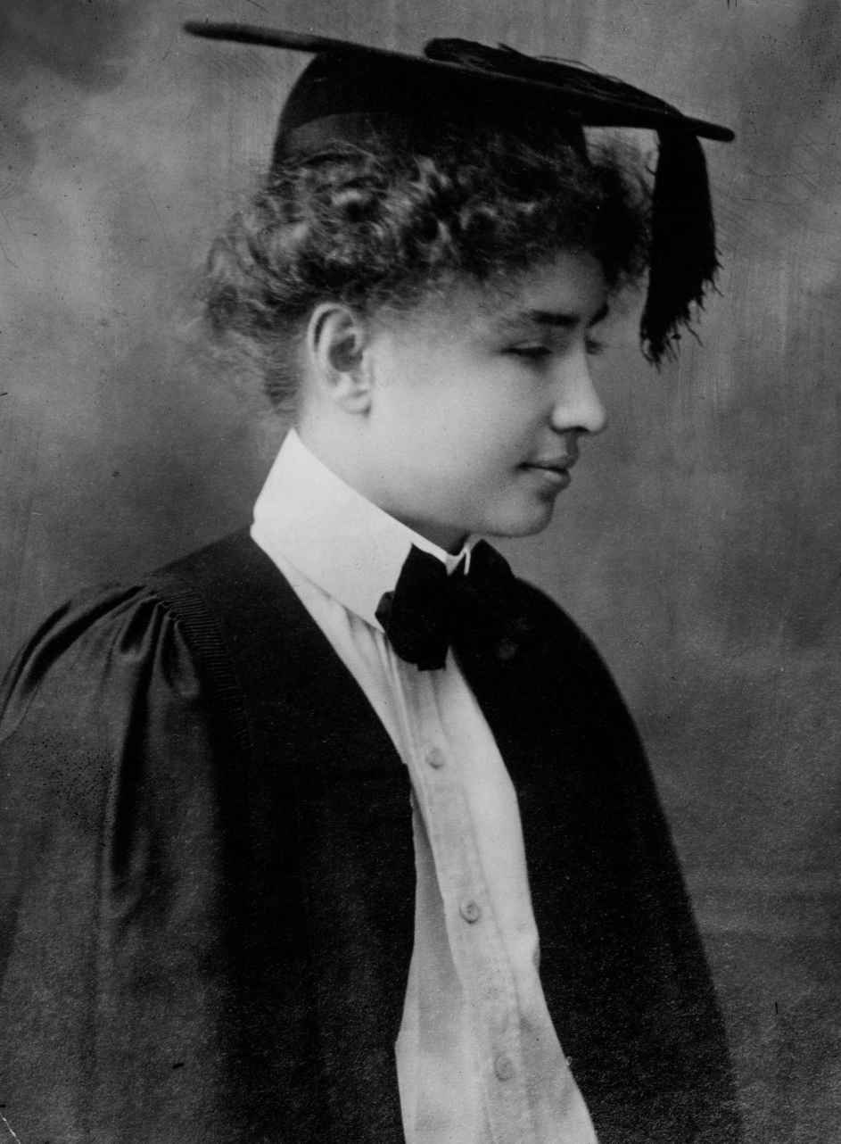 Helen Keller in her graduation cap and gown, in profile